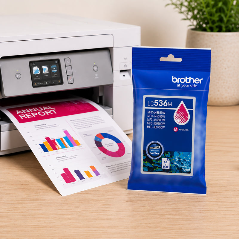 Brother LC536M Magenta Ink Cartridge displayed beside a Brother printer producing a colourful business report. The image highlights genuine Brother ink performance, vibrant magenta colour reproduction and reliable printing quality for professional office documents and everyday colour printing tasks.