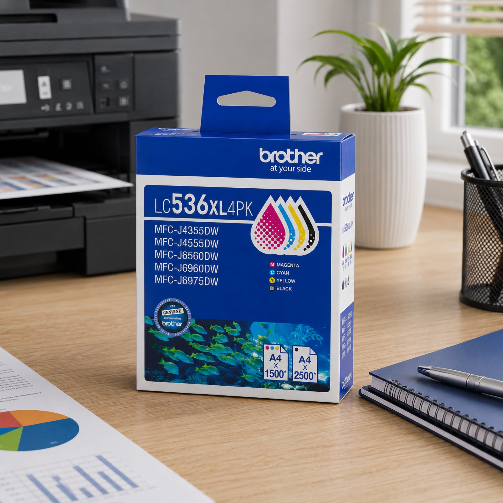 Angled product display of the Brother LC536XL4PK High Yield BCMY Ink Cartridge Multipack placed on a desk alongside printed charts, business reports and office accessories. The Brother printer in the background reinforces compatibility and intended use. The image highlights the convenience of having all four genuine Brother cartridges in one pack, making it ideal for continuous office productivity and vibrant colour output.