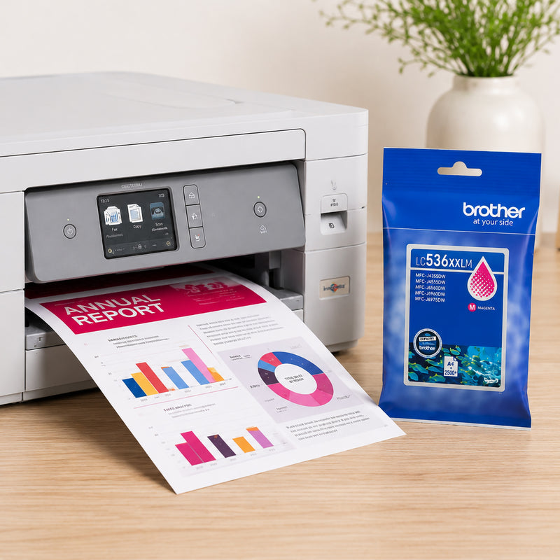 Brother multifunction inkjet printer producing a colourful business report while a genuine Brother LC536XXLM super high yield magenta ink cartridge package stands beside the printer. The image highlights vibrant colour output, professional document quality and compatibility with Brother office printing systems.