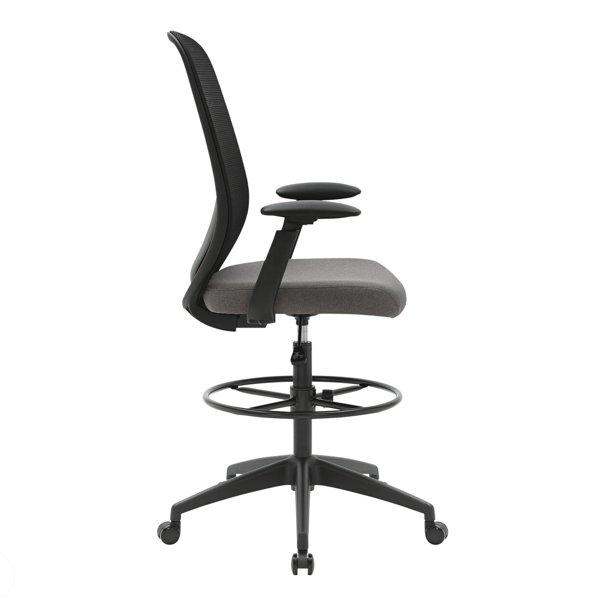 Side view of the black framed Buro Force drafting chair showing the grey seat, armrest height and the foot ring on the gas lift