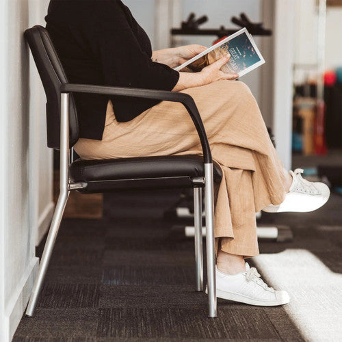Buro Lindis 4 Leg chair in a reception area, showing full profile and seat depth