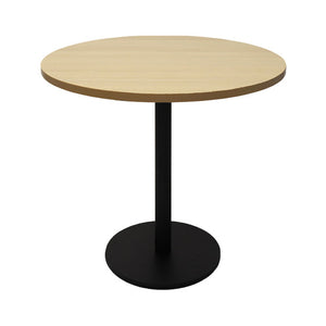Rapidline Estilo 900mm round table with a natural oak top on a black column and flat disc base, viewed from slightly above