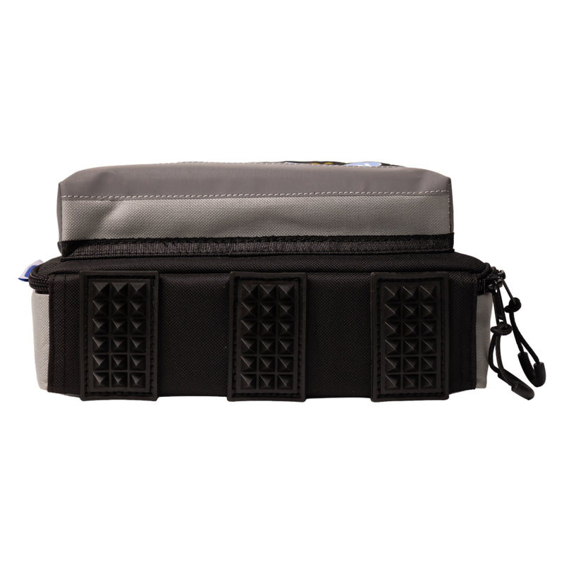 Bottom view of the CardiAct Mindray Soft Carry Case on a white background, showing three textured protective base sections, black lower construction, grey exterior panels and zip closures. The detailed product view highlights features designed to support durability when the AED case is placed on floors, shelves or other surfaces.