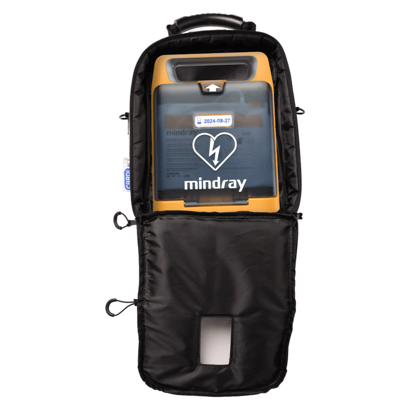 Open CardiAct Mindray Soft Carry Case shown on a white background with a compatible Mindray AED secured inside. The front opening provides a clear view of the fitted internal storage area and demonstrates how the soft carry case helps keep the defibrillator protected and organised between uses.