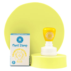 Retail packaging and Champion Effort self inking merit stamp presented together on a display platform. The trophy themed reward stamp is designed to celebrate hard work, perseverance and student success.