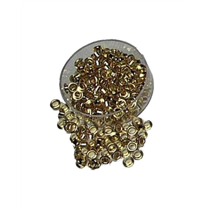 A clear tub of Colby KW-9707 brassed eyelets with loose gold coloured eyelets spilling out in front of it
