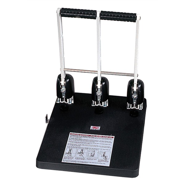 Colby KW-953 three hole power punch with twin lever arms and black grip handles above three punch heads on a black base with an instruction label