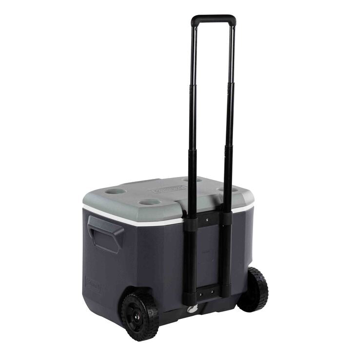 Coleman Daintree 57L Wheeled Hard Cooler Grey, shown in use, showing the grey wheeled hard cooler.