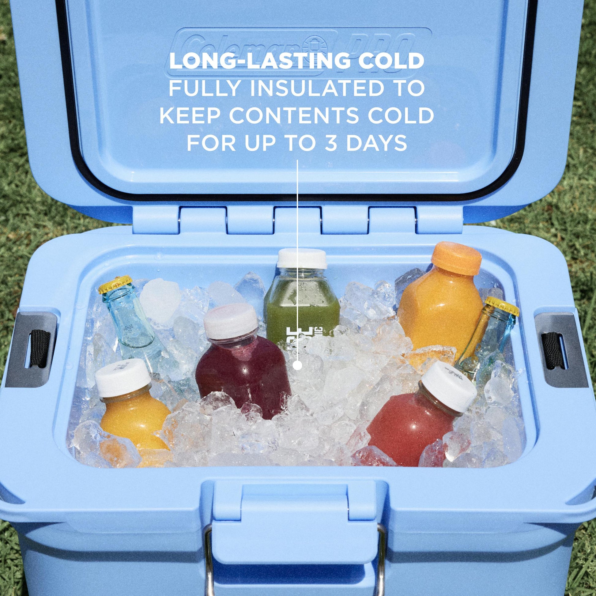 Coleman Pro 24L Hard Cooler Sky Blue, shown in use, showing the sky blue hard cooler.