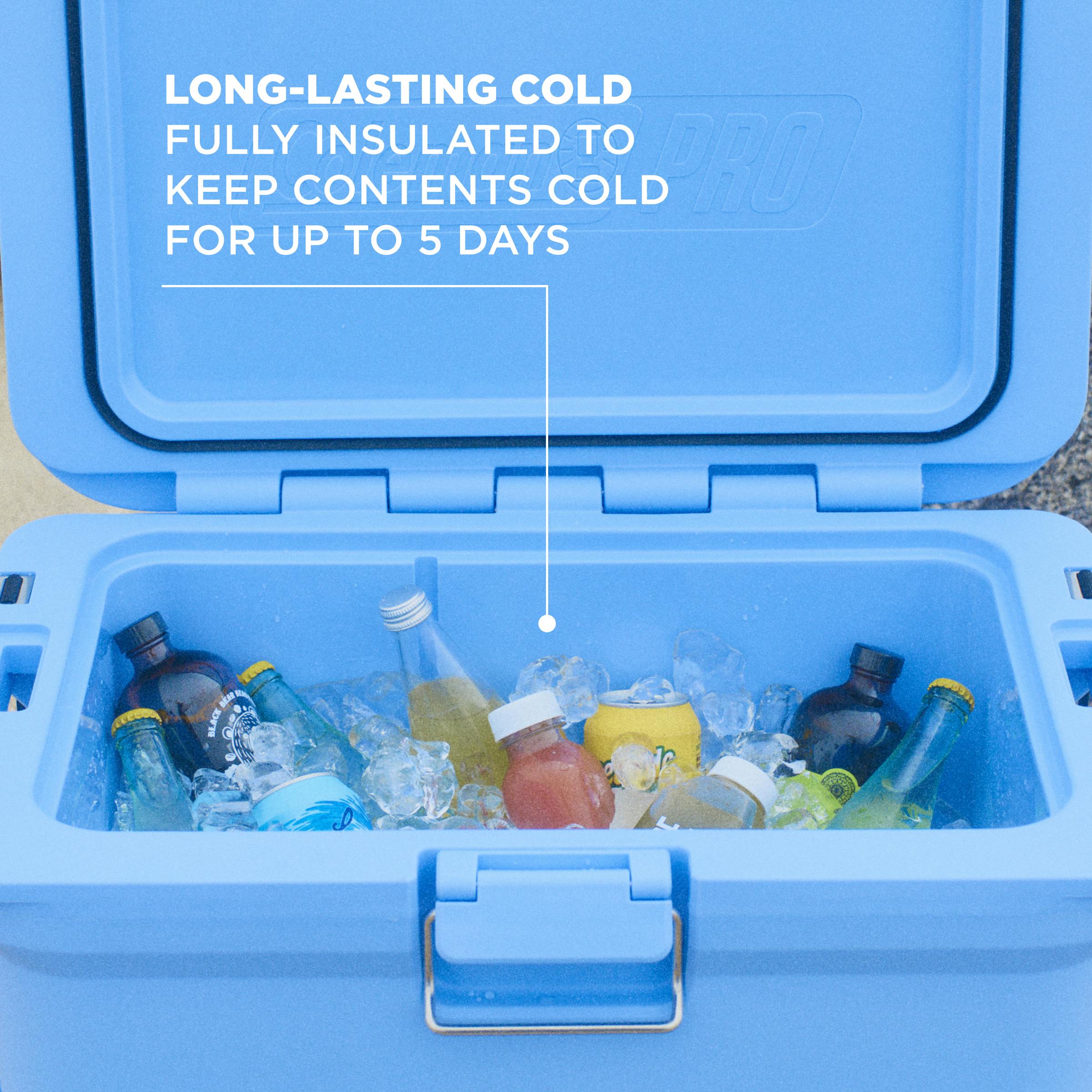 Coleman Pro 52L Hard Cooler Sky Blue, shown in use, showing the sky blue hard cooler.
