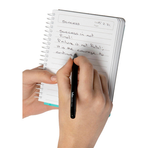 Hand writing in a ColourHide chunky side opening spiral notebook on ruled pages