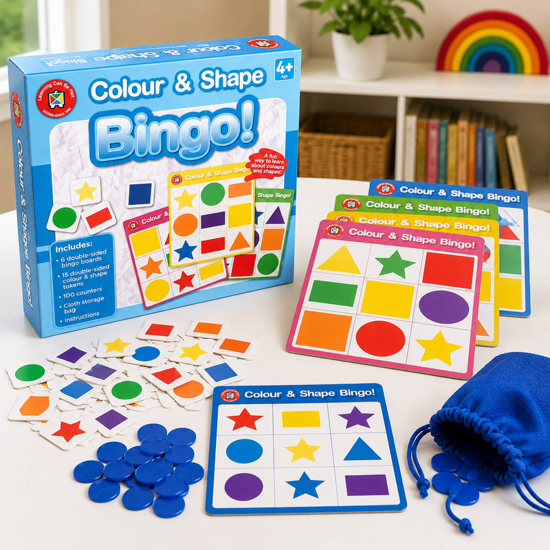 Complete Colour and Shape Bingo educational game set displayed with retail packaging, colourful bingo boards, shape matching tokens, blue counters and storage bag. The image showcases all included components designed to support colour identification, shape recognition and engaging learning through play.