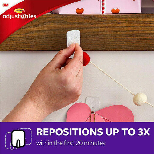 Pack contents laid flat showing 6 clear hooks and 12 refill strips