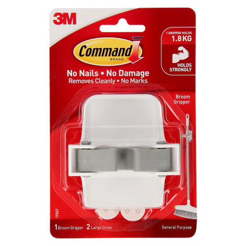 Command Broom Gripper Large White mounted on a smooth white wall