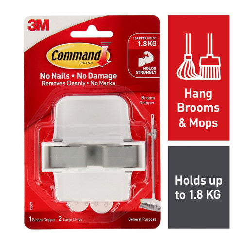 Command Broom Gripper holding a broom handle securely in place