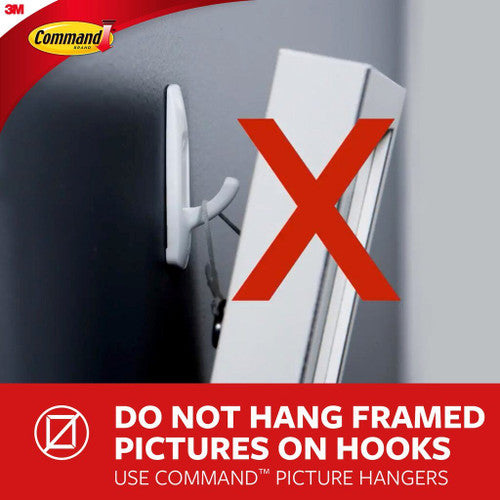 Adhesive backing of the Command Double Hook ready for application