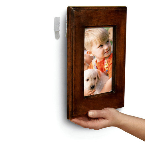 Picture frame mounted on painted wall using Command Small Hanging Strips