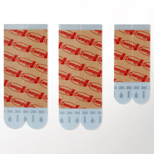 Command refill strips removed cleanly from a painted wall with no damage