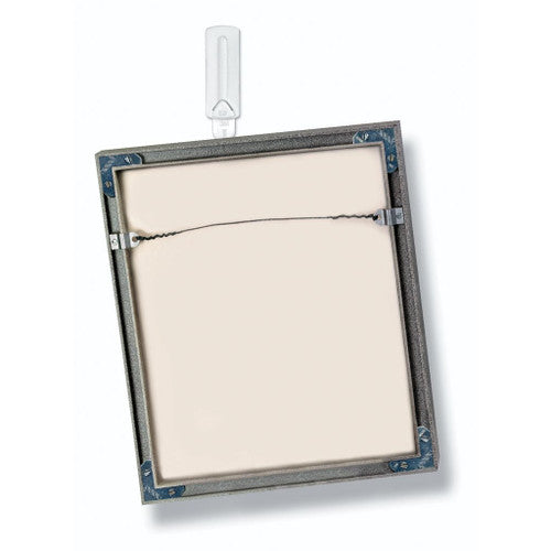 Three Command large white wire-back hangers laid out on flat surface