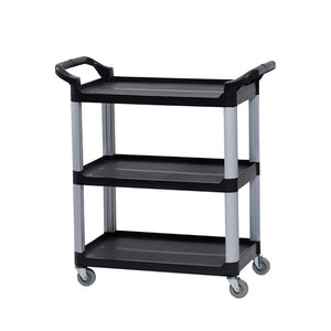 Compass 7224941 compact three shelf utility cart on a white background, showing black moulded shelves, grey silver pillars with moulded push handles and four black swivel castors.