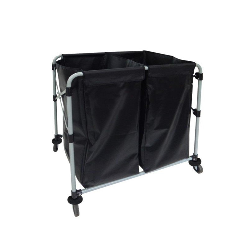 Compass 722497 laundry cart photographed against a white background: a folding X frame carrying two black vinyl bags side by side, divided down the centre, on four castors.