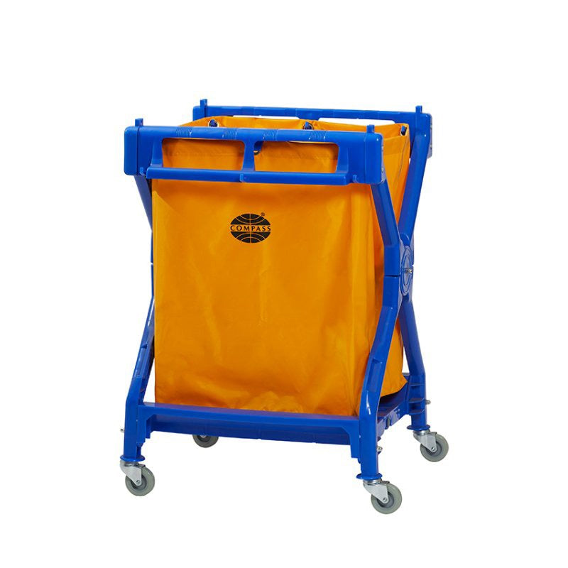 Compass 722498 scissor laundry cart on a white background: a blue tubular scissor frame carrying an amber yellow nylon bag with the Compass roundel, standing on four castors.