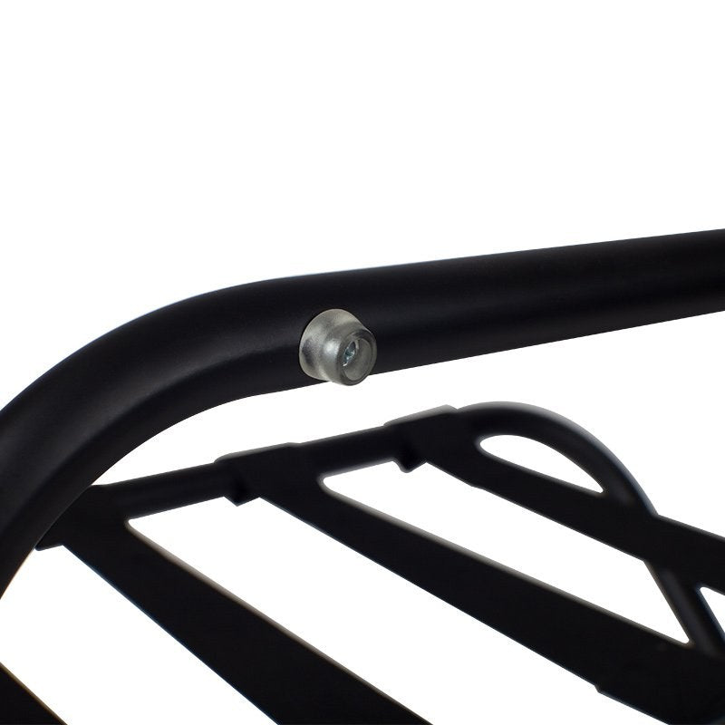 Close view of a clear rubber bumper fitted to the black back rail of the Compass luggage rack