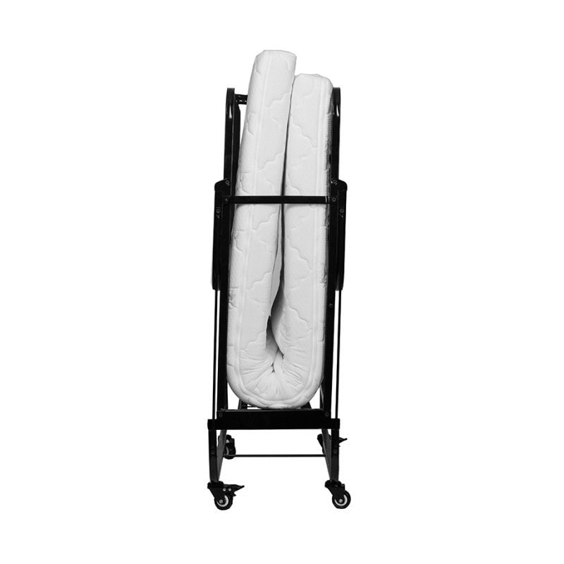 Side view of the Compass standard fold up bed folded upright, showing how slim it is with the mattress inside