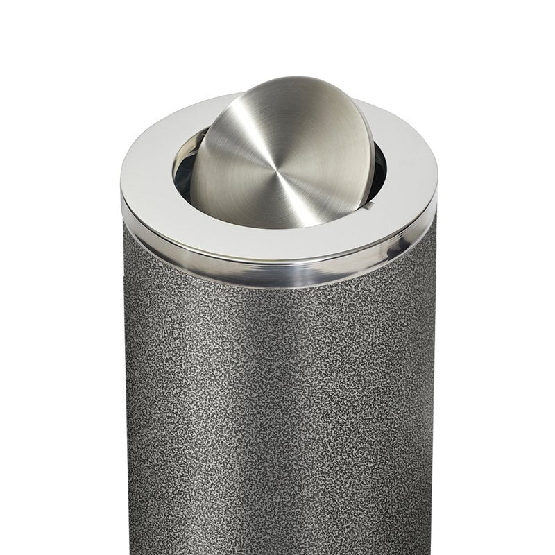 Close view of the stainless steel swing flap and rim on top of the Compass hammertone grey bin