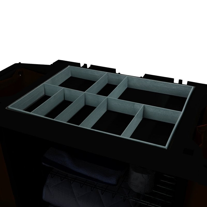 The grey Compass divider sitting in the top of a black housekeeping trolley, its eight bays holding guest room supplies