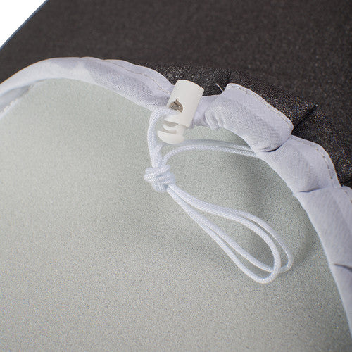 Compass black ironing board cover fitted to a large ironing board showing smooth surface