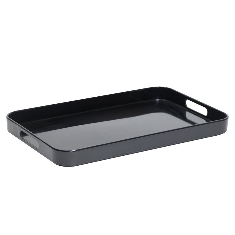 Large black Compass melamine tray with raised sides and a cut-out handle at each short end, seen at an angle
