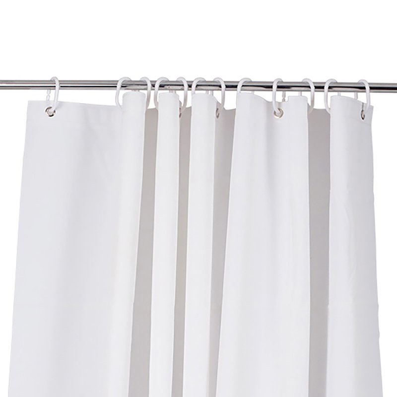 Compass plain white PEVA shower curtain hanging in folds from a chrome rail on white plastic rings
