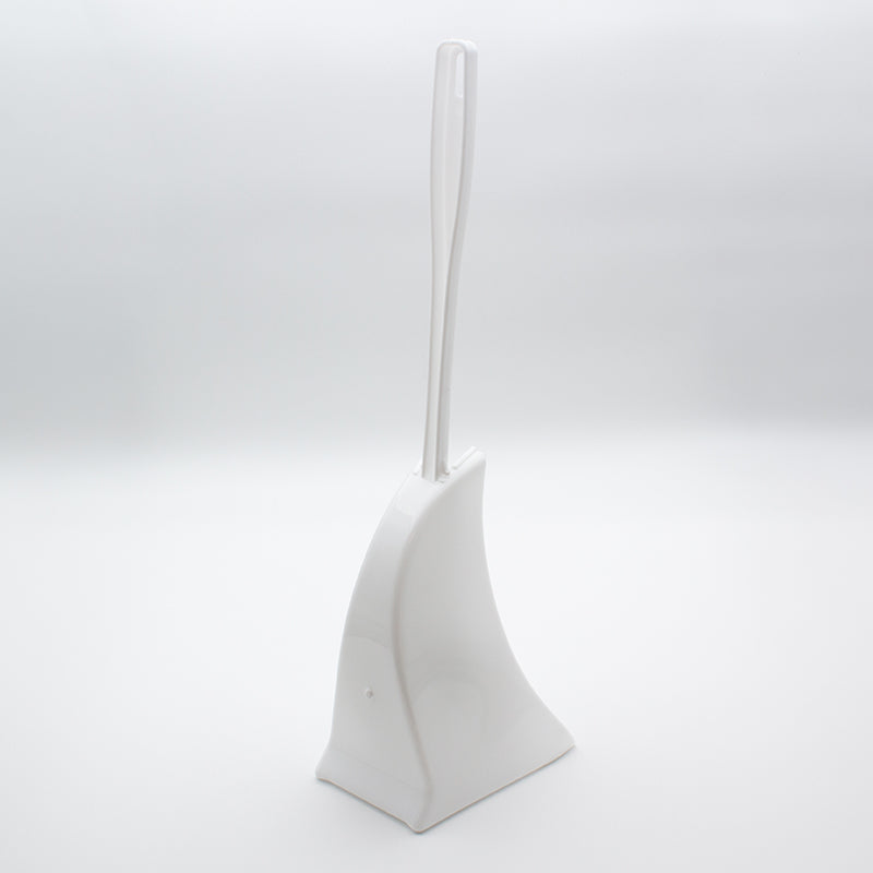 White holder seen from the front on a pale grey background with the brush handle standing straight up