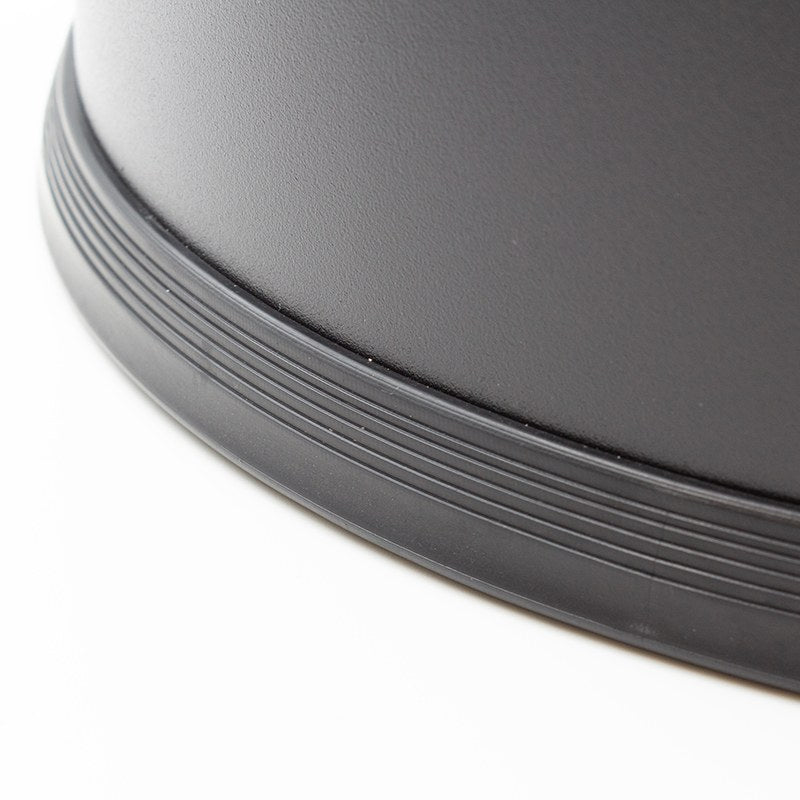 Close view of the ridged black rubber ring around the base of the Compass round dual chamber bin