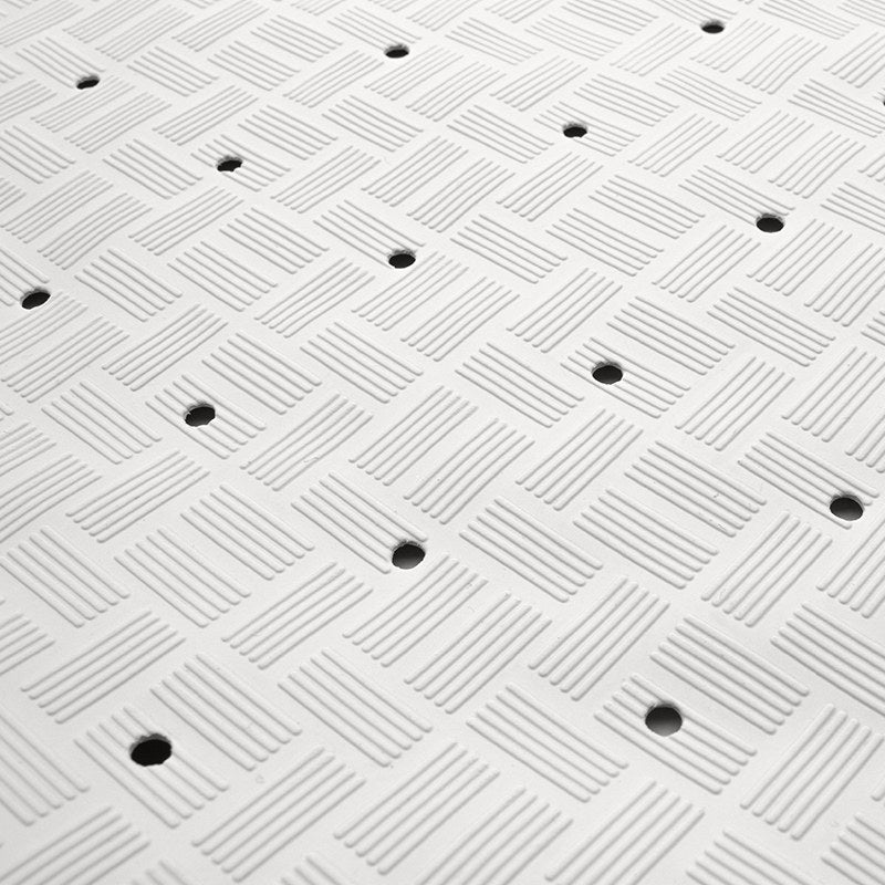 Flat close-up of the basket-weave pattern on the top face of the small rubber bath mat with drain holes