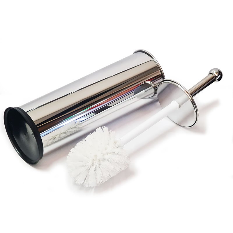 Polished steel caddy lying on its side next to the brush, which has a white round bristle head and a steel lid disc