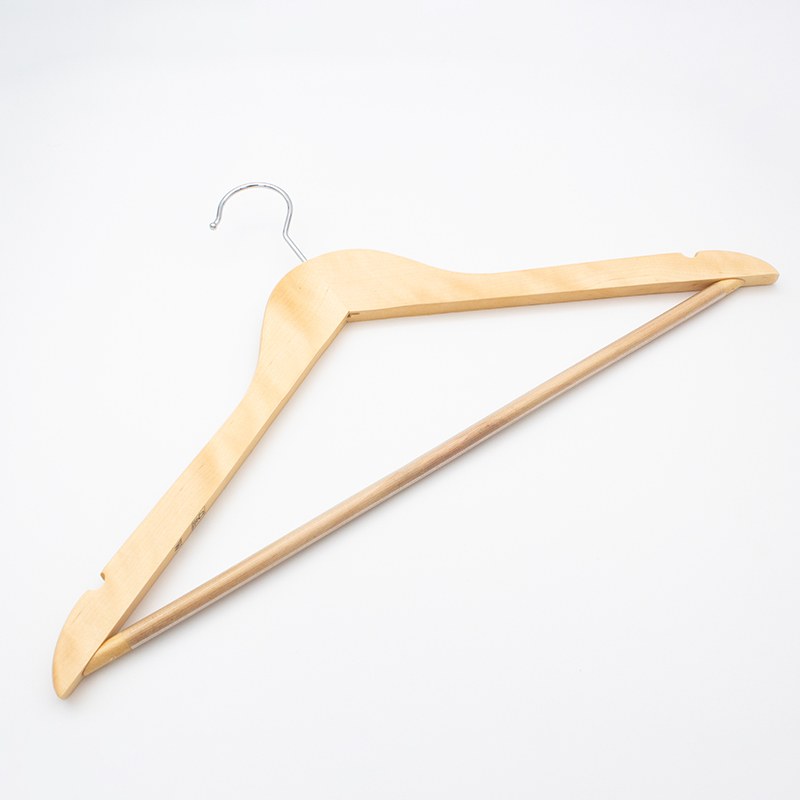 Angled view of the Compass light wood hanger showing the length of the PVC covered rod between the shoulder ends