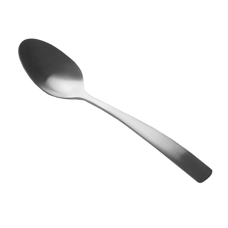 Connoisseur Satin dessert spoon on white, brushed oval bowl at the upper left and a squared handle at the lower right