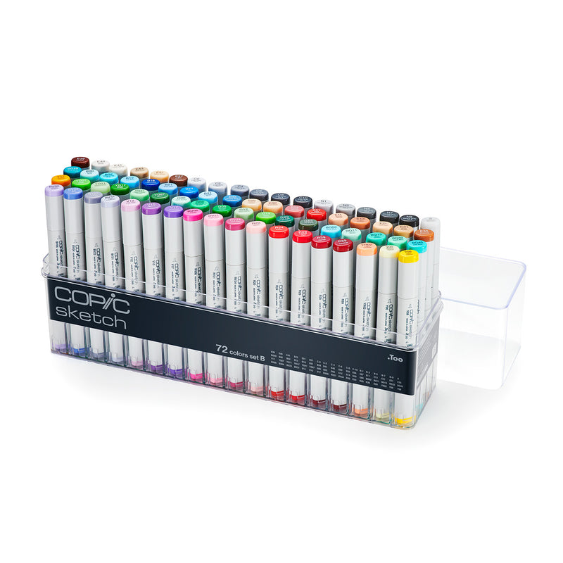Seventy-two Copic Sketch Set B markers in an open clear acrylic tray with lid beside