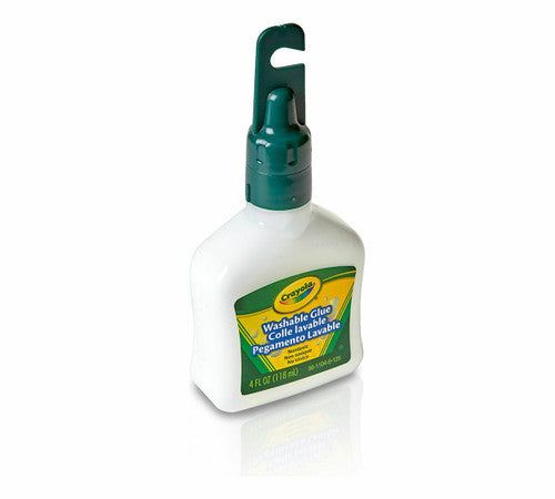 Crayola washable school glue placed alongside children's craft materials on a desk
