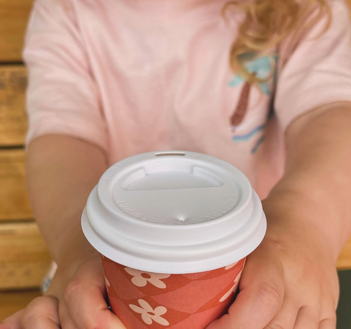 4oz babycino cup fitted with its white PP lid, ready for a small takeaway drink