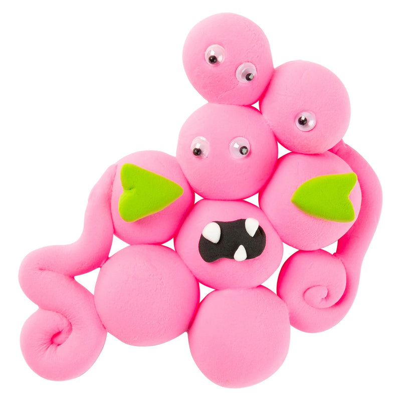 Detailed product example featuring a whimsical pink creature made from rounded clay shapes with textured surfaces and decorative features. The image demonstrates how the clay can be used to create colourful characters, artistic models and imaginative craft projects.
