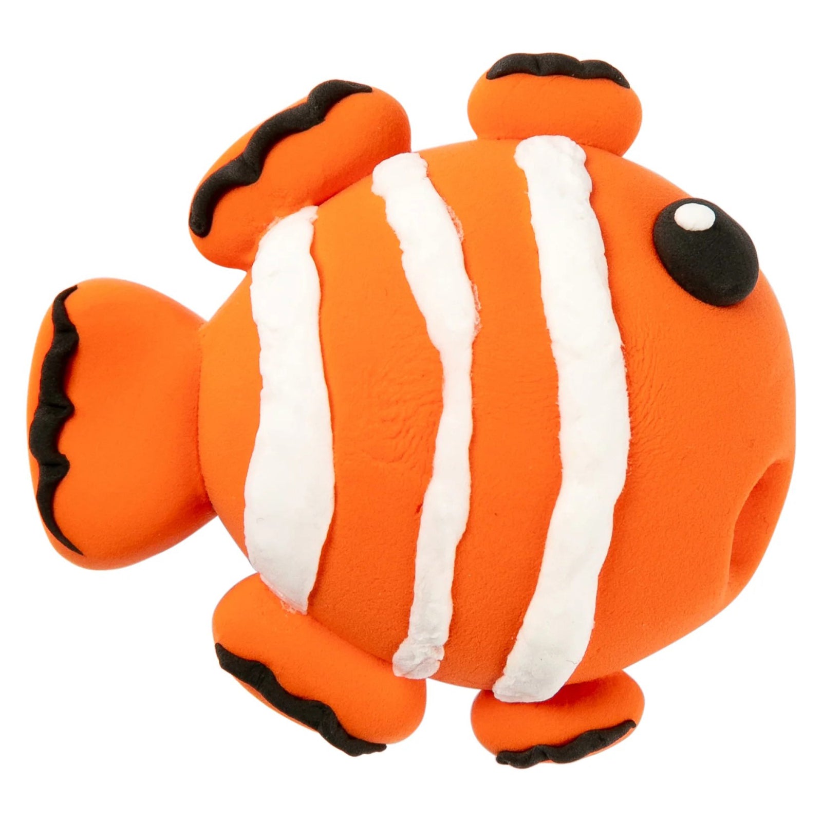Finished clownfish sculpture displayed on a white background, highlighting detailed shaping, clean contours and the lightweight properties of the dried modelling clay.