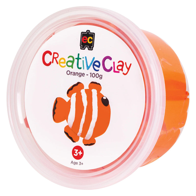 Retail packaging of Educational Colours CreativeClay Orange 100g featuring colourful branding and a clownfish example project. The image presents the product clearly for online shopping and catalogue displays.