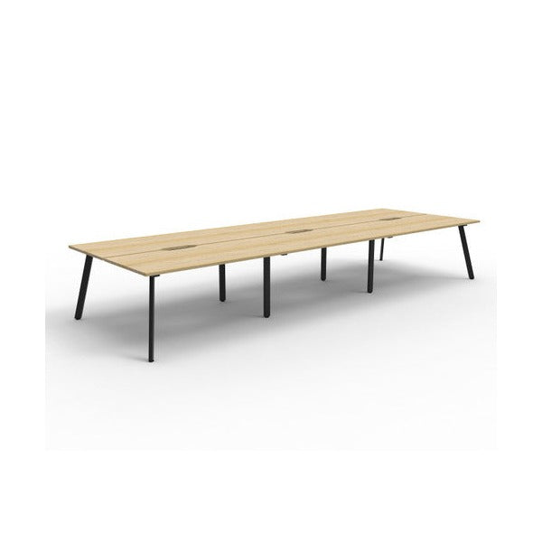 Rapidline Eternity back to back 6 person workstation in Natural Oak with a Black Satin base, no screen, wide angled studio view on a white background