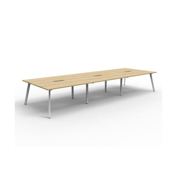 Rapidline Eternity back to back 6 person workstation in Natural Oak with a White Satin base, no screen, wide angled studio view on a white background