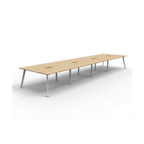 Rapidline Eternity back to back 8 person workstation in Natural Oak with a White Satin base, no screen, wide angled studio view on a white background