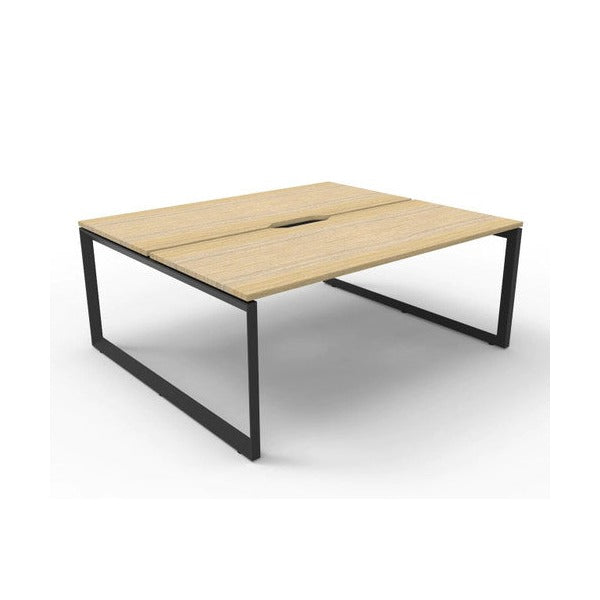 Rapidline Deluxe Infinity back to back 2 person loop leg workstation, Natural Oak top on Black Satin base, angled view along the run from the front left