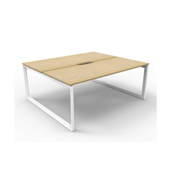 Rapidline Deluxe Infinity back to back 2 person loop leg workstation, Natural Oak top on White Satin base, angled view along the run from the front left